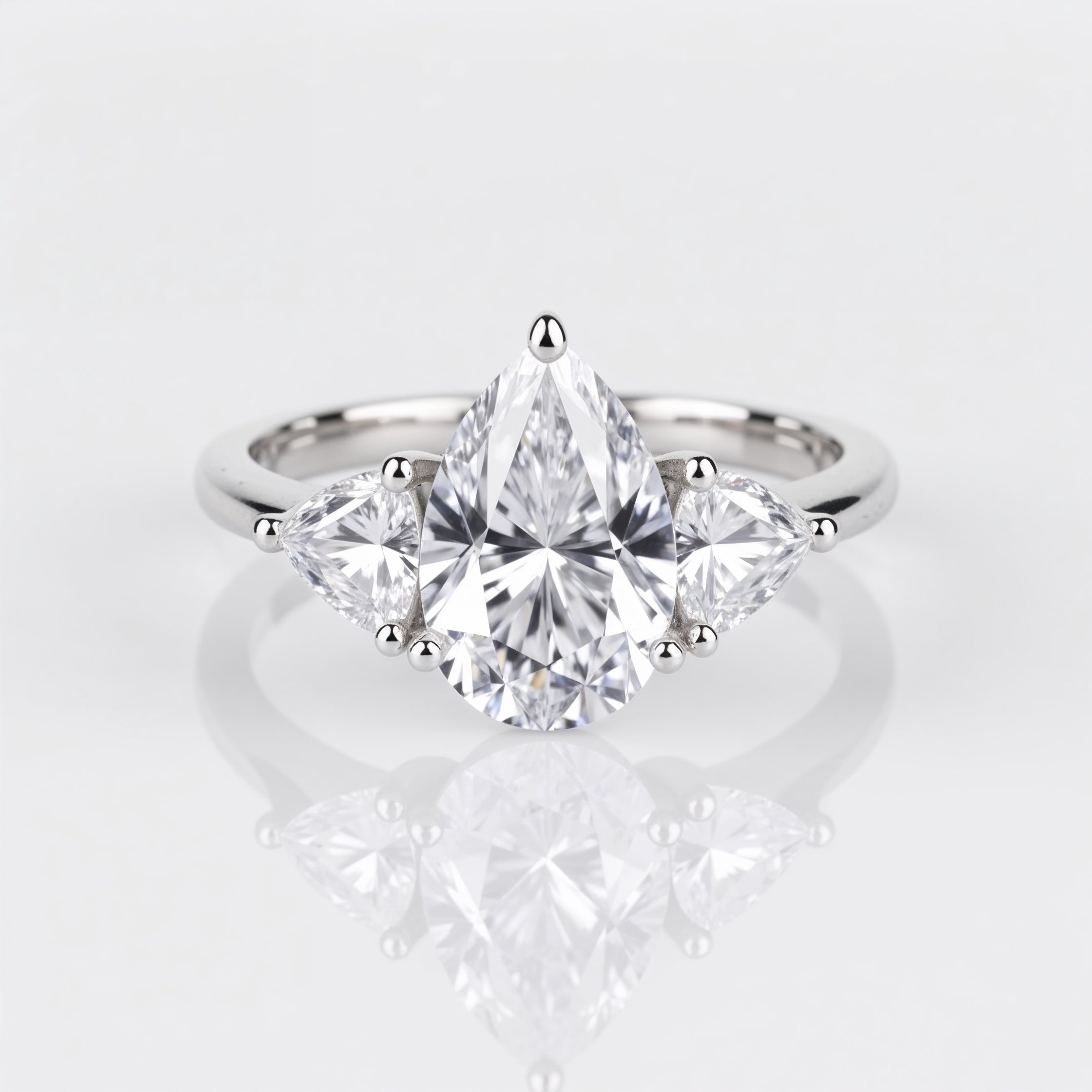 Timeless Pear Cut Trilogy Engagement Ring