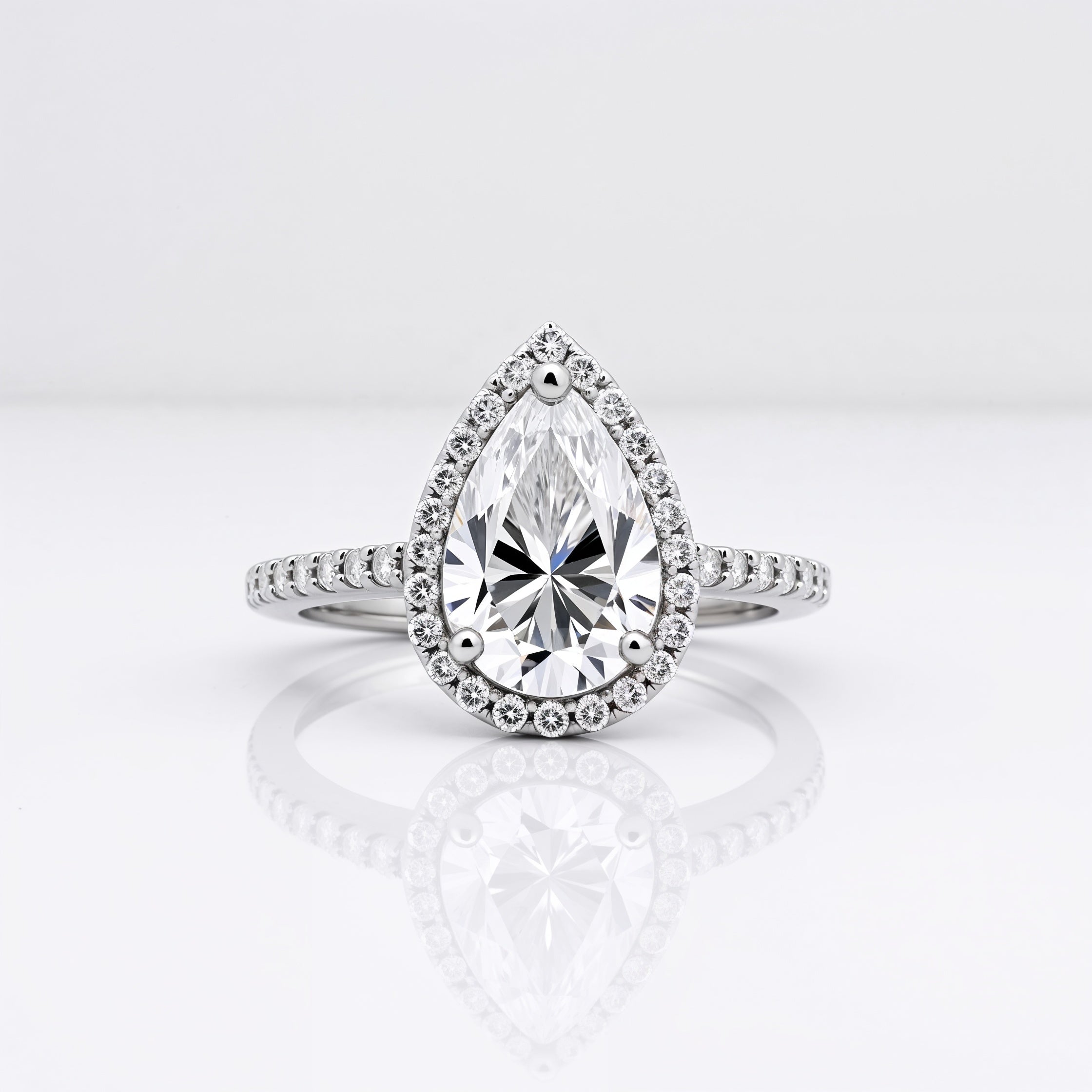 Divine Pear Shaped Halo Engagement Ring