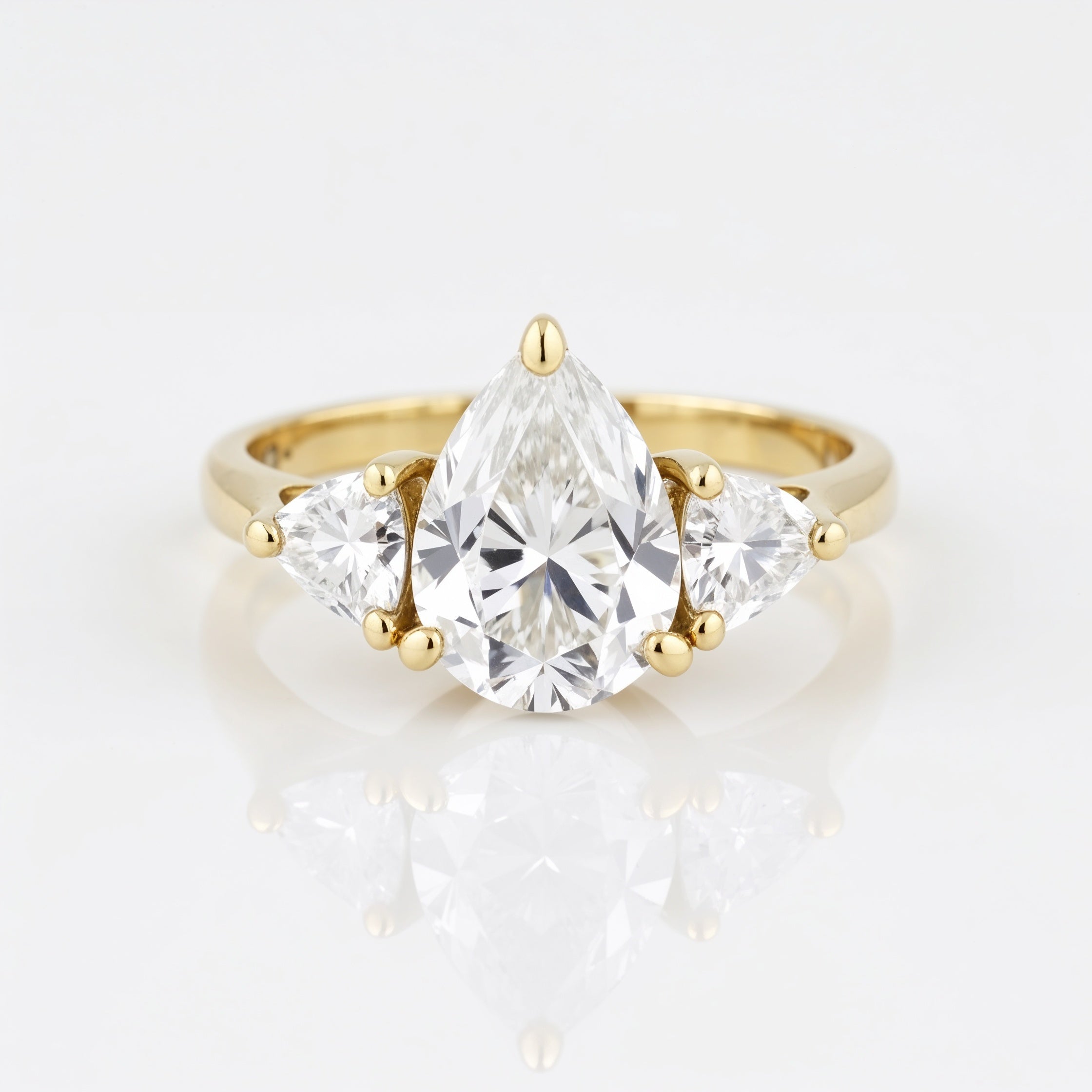 Timeless Pear Cut Trilogy Engagement Ring