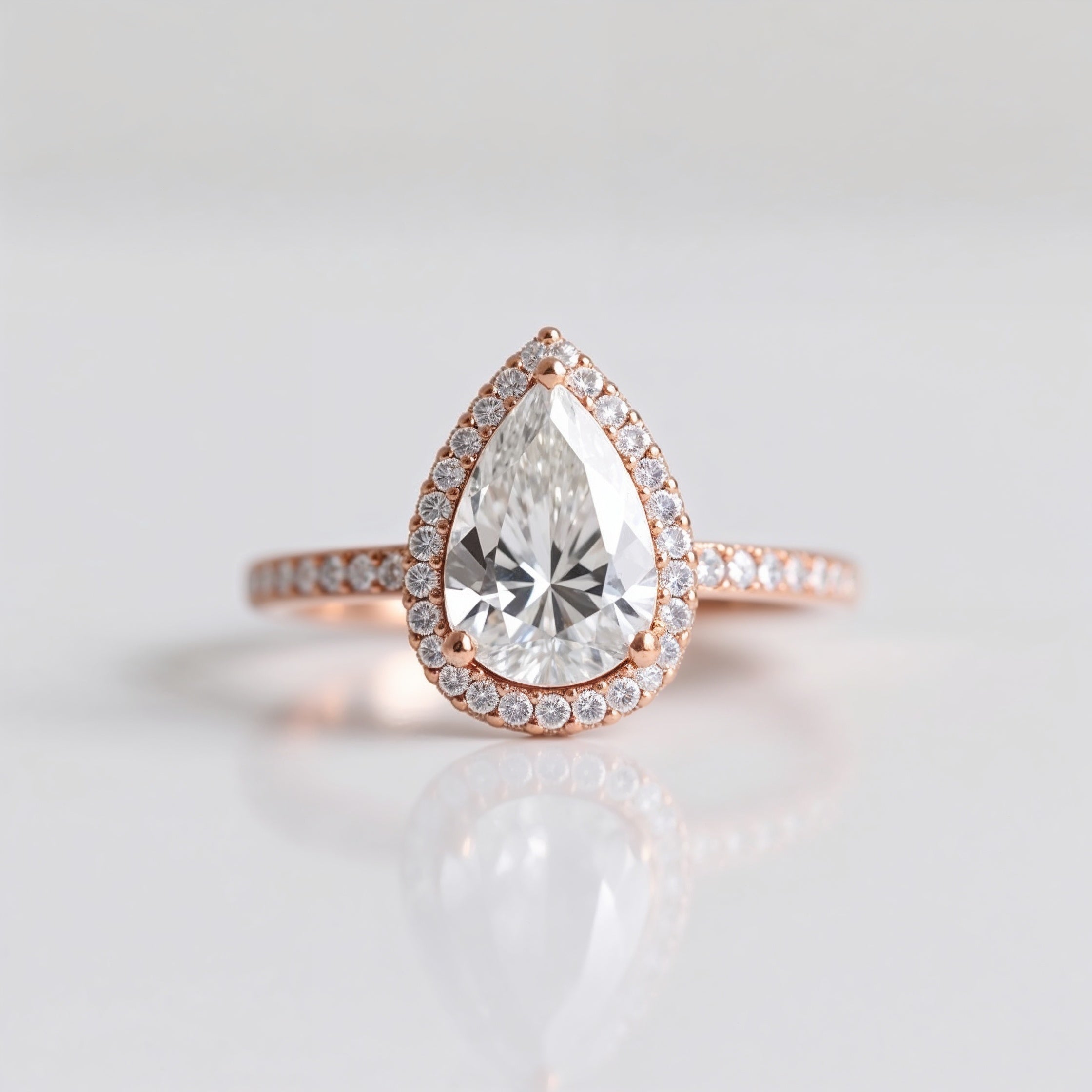 Divine Pear Shaped Halo Engagement Ring